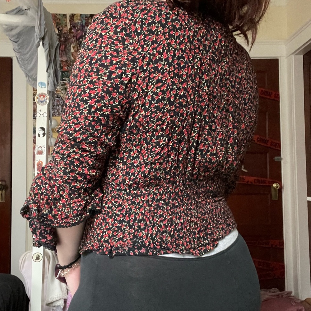 Red and black flower top with open sleeves